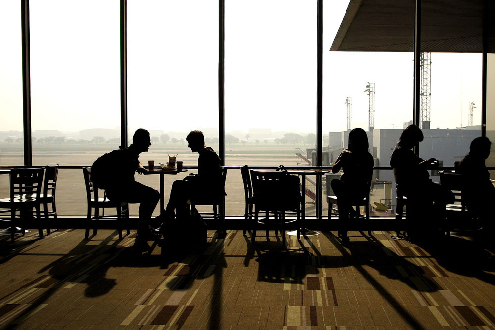 People at airport cafe