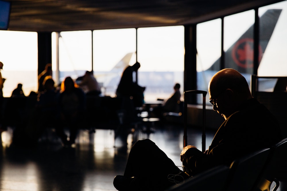 People sitting at the airport waiting
